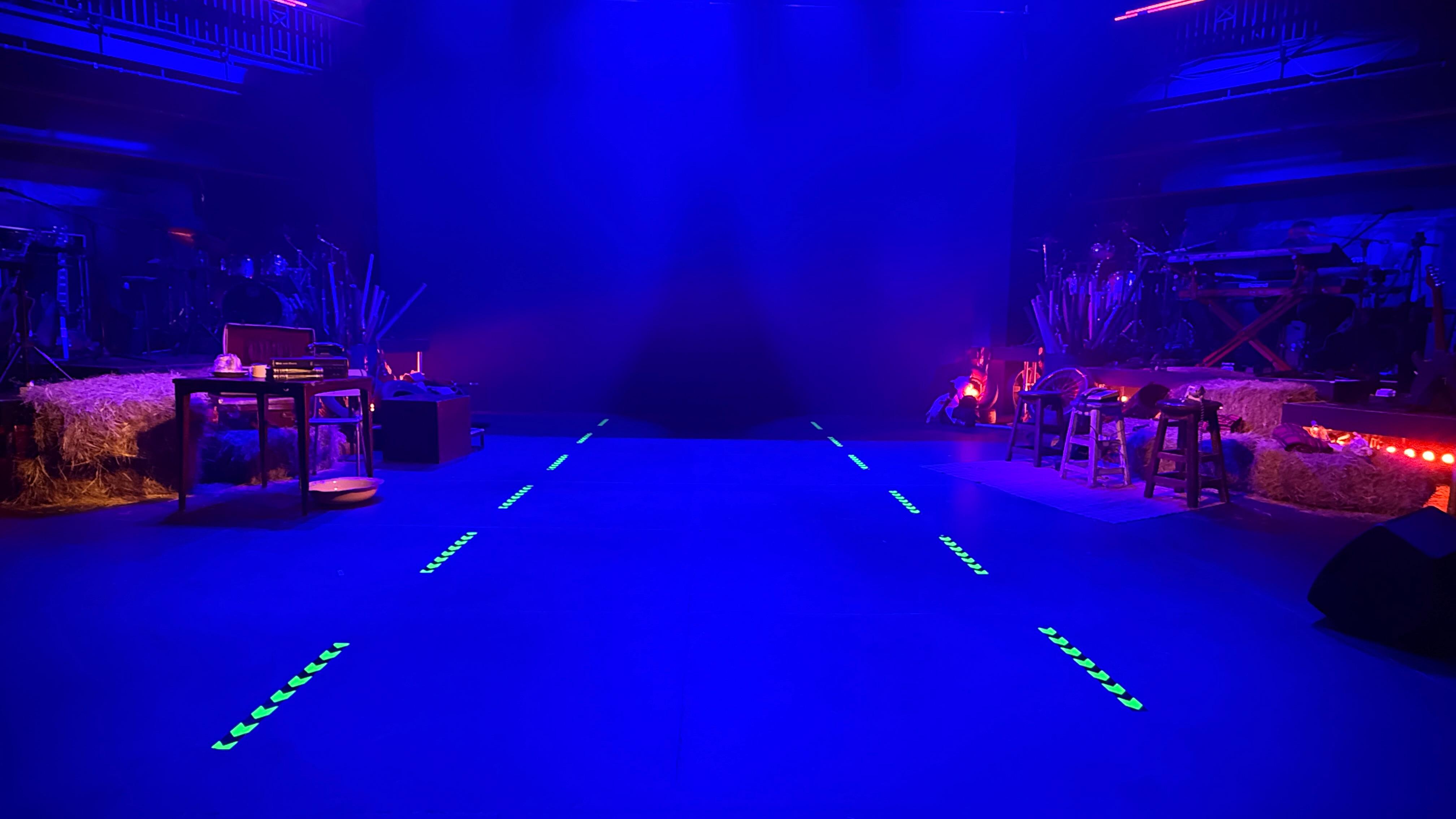 Judah — Album Recording & Theatre Show, blue-wash stage with hay-bale set
