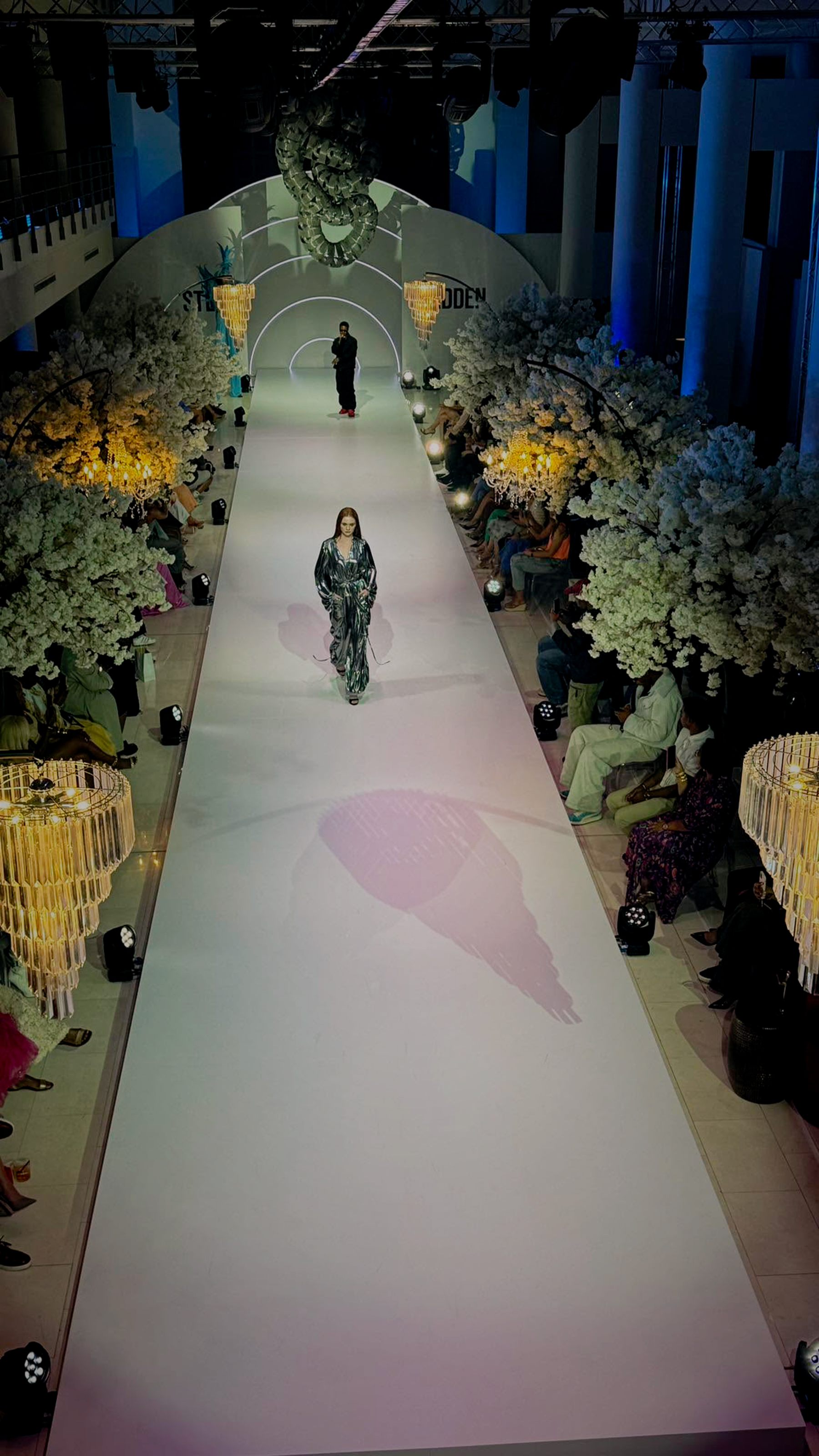 Steve Madden — runway activation with cherry-blossom trees and chandeliers